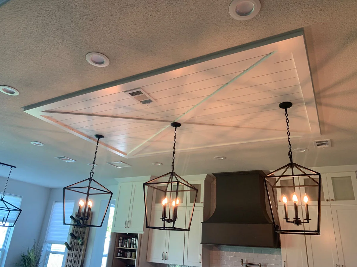 Detailed coffered ceiling with lighting